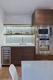 Sleek Midcentury Modern Party Pad Mid Century Modern Kitchen Design Modern Kitchen Backsplash Kitchen Decor Modern