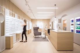 The Opposing Wall Is Masked With A Semi Translucent Floor To Ceiling Drape Which Softens The Chaos Of The Window F Shop Interior Design Design Interior Design