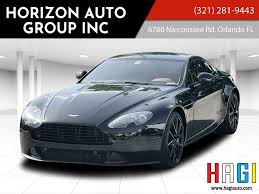 Image result for Onyx Black 2011 Aston Martin