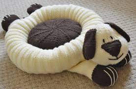 You can make more stuff and this beautiful lace leaf dog coat is gorgeous at any time of year but particularly suitable for christmas, with those lovely bobbles along the back and the festive. Doggy Snuggler Pet Bed Knitting Pattern Knitting By Post