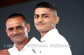 Face-off images of Junior Binnu Singh and Runqi Zhou during the weigh-in  for the 2025 Kings Boxing Promotions event at Sukuna Park in Suva. Photos  by Kunal Keshneel. #FijiLiveGallery #JuniorBinnuSingh #RunqiZhou  #2025KingsBoxingPromotionEvent #