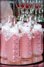 Pretty Pink Bird Themed Girl Baby Shower Pink Lemonade In Baby Bottle With Striped Straws Baby Shower Fun Baby Shower Themes Cute Baby Shower Ideas