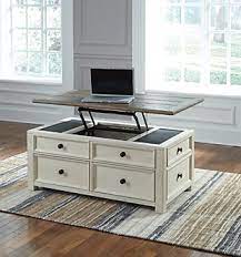 This one is a real classic, it is suitable for any kind of space, and it will perfectly serpentine legs and glass tabletop are the main features of this ashley furniture coffee table. Bolanburg Coffee Table With Lift Top Ashley Furniture Homestore