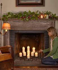 35 super fast fixes and easy upgrades candles in fireplace faux fireplace fireplace