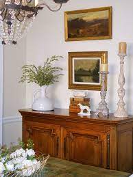 The buffet decor is classic, adding a juxtaposition of bling and burlap! Decor We Adore French Inspired Design Ideas Dining Room Buffet Decor Sideboard Decor Dining Room Buffet