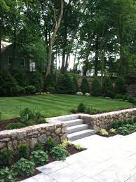 Gravity retaining wall, cantilever retaining wall, counterfort retaining wall, are different types of retaining walls are the structural components, which are designed with the purpose to retain the soil. Carey Ezell Landscape Design Landscaping Retaining Walls Front Yard Landscaping Landscape Design