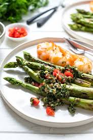 It's a food that pleases even the pickiest of eaters, it's fairly inexpensive and it's easy to cook. Grilled Asparagus With Italian Salsa Verde Tiger Prawns
