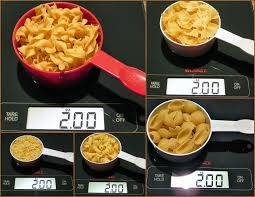 A single serving size of pasta is typically about two ounces of dry pasta—amounting to about a cup of cooked pasta. The Iowa Housewife Make It Yourself Measuring Dry Pasta