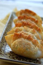 It is stuffed with a combination of beef and various vegetables. Eating And Living Mandu Korean Dumplings Korean Dumplings Recipes Food