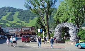 Jackson Wy Part Of Downtown Square You Can See One Of The Elk Antler Arch S Jackson Hole Vacation Jackson Hole Wyoming Jackson Hole Town
