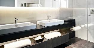 Relaxing bathroom with woodern table. 5 Design Ideas To Help Create A Relaxing Bathroom Grand Designs Magazine