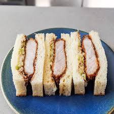 Konbi Eater The Crispy Pork Katsu Sando At Konbi La Served On Plush Milk Bread And A Touch Of Tangy Brown Katsu Sauce Eater La Editor