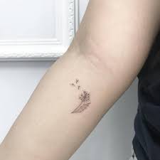 Amazing birds blowing from dandelion tattoo. Small Tattoos By Jk Kim Done In Queens Http Ttoo Co P 34759 Dandelion Tattoo Dandelion Tattoo Small Dandelion Tattoo Design