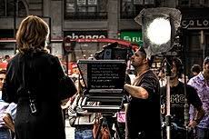 Proclaim formally or put into operation (a law, decree of a court, etc.). Teleprompter Wikipedia