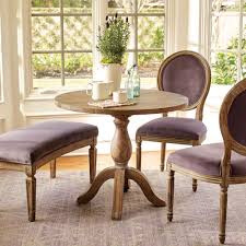 We all like the round coffee table. World Market Round Weathered Gray Wood Jozy Drop Leaf Table Lazysuzy