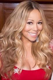 Mariah looks amazing with this long, smooth hairstyle that features a center part and long side swept layers/fringe on each side of the face. Pin On Mariah Carey