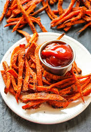Add the spices to the fries, and toss. Extra Crispy Baked Sweet Potato Fries Layers Of Happiness