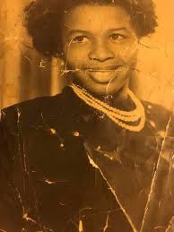 Please clear this picture for me, its my late grandma's make it look  beautiful