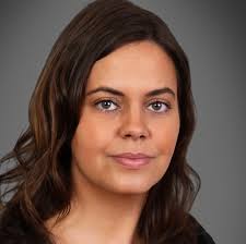 Sally Bass, Real Estate Agent.