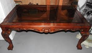 $30.00 to l****l tax, shipping & handling and internet premium not included. Sold Price A Smoked And Etched Glass Top Coffee Table Invalid Date Aest