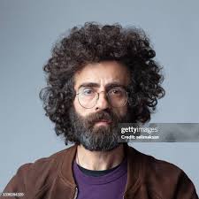 182.371 Guy With Long Hair Stock Photos, High-Res Pictures, and Images