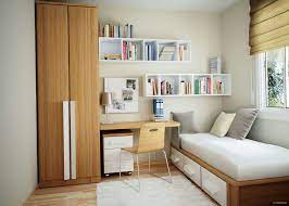 On the wall behind the sofa, the chinoserie wallpaper and golden mirrors work together to give the room a touch of flash without overstating their presence and drowning the sofa out. 31 Lovely Bedroom Storage Ideas For Small Spaces 22 In 2021 Interior Design Apartment Bedroom Minimalist Bedroom Decor Small Bedroom Decor