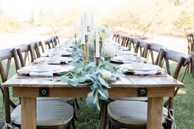 This shape is perfect for sharing dishes among guests at a dinner party and fostering lively conversation. Farmhouse Table Blossom Farm Vintage Wedding Rentals