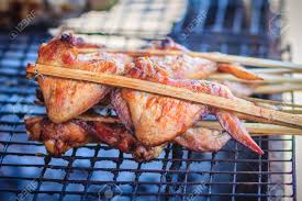 Check spelling or type a new query. Grilled Chicken In Bamboo Stick On Charcoal Stove For Sale On The Street In Bangkok Thailand Stock Photo Picture And Royalty Free Image Image 83883894