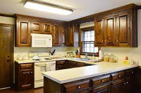 Make sure you have 2 to 3 people to help you lift, remove and carry the cabinets away from the room. Removing Some Kitchen Cabinets Rehanging One Young House Love