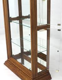 Range sensitive lighting with touch controlled dimmer. Tall Narrow Side Doors Beveled Glass Oak Curio Display Cabinet At 1stdibs
