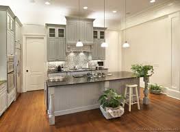 The warm texture and colour of wood enhances and contrasts with the cool detachment of grey. 160 Gray Kitchens Ideas Kitchen Design Grey Kitchen Cabinets Kitchen Remodel