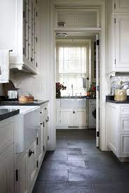 Black or gray grout can also be used to create a more industrial look. Pin By Jen Kane On My Future Home Slate Floor Kitchen Slate Kitchen Kitchen Floor Tile