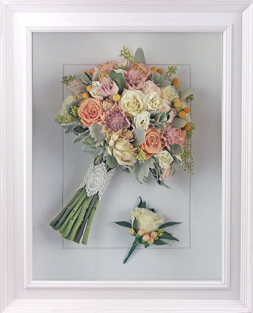 Something a little different for all you flower lovers. Here are some wedding bouquets that I have freeze dried and framed for my brides to keep forever. If you want to find