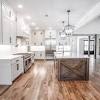 Inside, it has volume ceilings throughout the first floor, lots of storage, and large open living concept with large front porch. 1