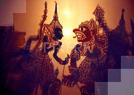 Wayang berasal dari kata ma hyang yang ertinya menuju kepada ruh spiritual, dewa, atau tuhan yang maha esa. Shadow Play Or Shadow Puppets Wayang Kulit Famous In Kelantan Malaysia By Ravindran John Smith Shadow Play Shadow Puppets Shadow