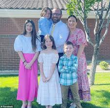 Father speaks out after double tragedy struck when his wife tried to stop  their two kids fighting in the back of the car