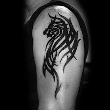 Dragon has been depicted in a lot of different ways in different cultures symbolizing different things. 60 Tribal Dragon Tattoo Designs For Men Mythological Ink Ideas