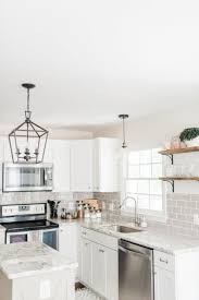 Lowe S Stock Cabinets Review Diamond Now Arcadia White Shaker Cabinets Elizabeth In 2020 White Shaker Kitchen White Shaker Kitchen Cabinets Shaker Kitchen Cabinets