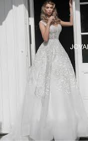 Also throwing in some purple here and there. Jovani Jb65936 Off White Embellished A Line Wedding Dress