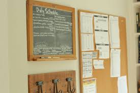 We took some cork that we found online ( amcork has an amazing selection of natural tiles of cork with beautiful patterns) and after measuring, ordered enough tiles to cover this area. Diy Cork Board What To Do With All Of Your Kids Artwork Important Papers Lehman Lane