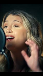 A Female Country Singer Singing in The Bar in A Music Video