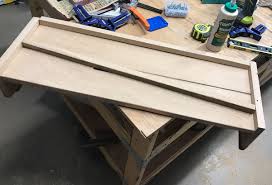 While it is the striking collection of edison bulbs hanging from the ceiling and the opulent image of the bathtub that steals the show here, the. Diy Bathtub Tray With Reclaimed Wood Deeply Southern Home