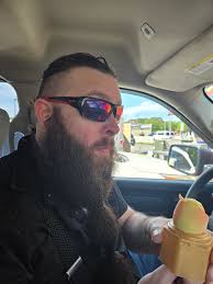 I think you look great with potential to be spectacular. I concur with the  others. You have a nice imposing physique. If the suit was tailored to  highlight that and your beard