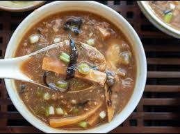 An egg on a slice of toast, with the yolk pierced and running onto the plate. Suan La Tang Hot And Sour Soup Recipe Youtube