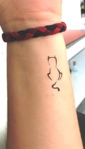 20 Cute Simple Cat Tattoo Ideas For Kitty Lovers Cat Tattoo Simple Cat Tattoo Small Wrist Tattoos For Guys