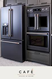 Penny Tile Matte Black Cafe Appliances And Dark Grey Cabinetry Make The Bon Appetit K Interior Design Kitchen Interior Design Kitchen Small Home Decor Kitchen