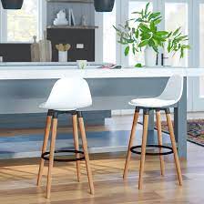 Short or counter height stools are typically 24 inches from the floor to the top of the seat and are best suited for counters and kitchen islands. Corrigan Studio Rochefort 26 Bar Stool Reviews Wayfair