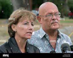 Oct 16, 2006; Camp Pendleton, CA, USA; DEANNA and TERRY PENNINGTON, of  Maui, Hawaii, parents of Marine Lance Cpl. Robert Pennington, speak to the  press near the base's Media Center after the