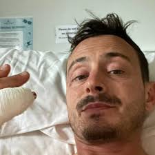 Isle of Man TT rider “hit wall feet first”, explains crash, “lucky to be  here”
