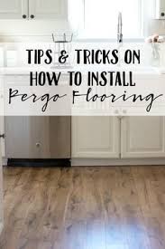 Tip And Tricks On How To Install Pergo Flooring Lauren Mcbride Pergo Flooring Diy Flooring Pergo Laminate Flooring